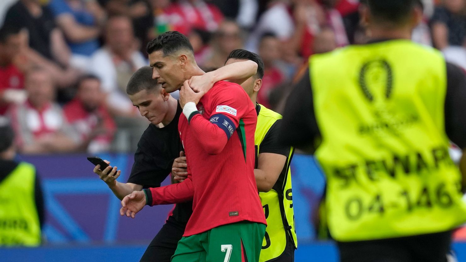 Cristiano Ronaldo Fans Invade Pitch at Euro 2024